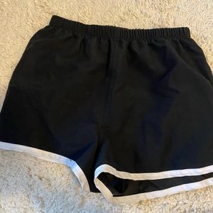 Black and white shorts.